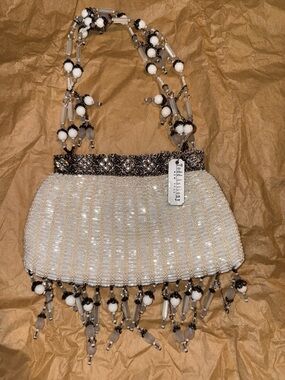 Beaded Ivory Evening Wristlet with Ornate Metallic Trim